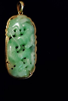 #ad   jade carved dragon 14k yellow gold pendant. 2quot;x 3 4quot; Appraised at $6000.00 $2500.00