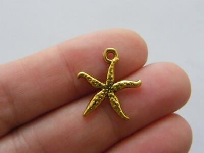 #ad 10 Starfish charms antique gold tone FF341 $4.25
