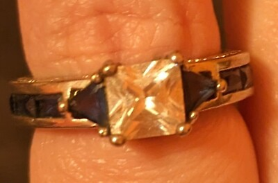 #ad Silvertone Ring with Sapphire Gemstones on Band White Center Gemstone $30.00