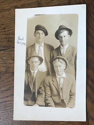 #ad Four Young Men in Hats Portrait Studio RPPC Postcard $5.00