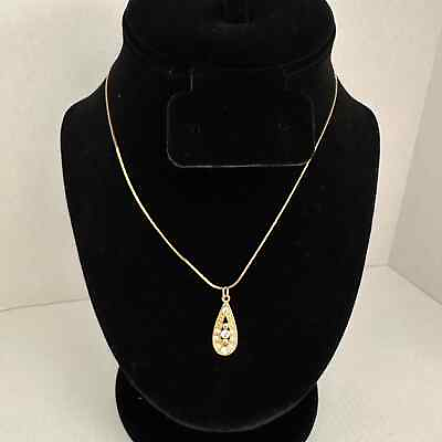 #ad Gold tone pendant with clear rhinestones on gold tone necklace $16.50