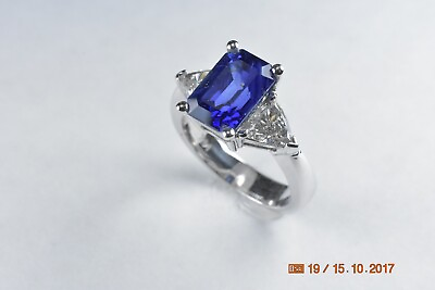 #ad Blue Sapphire and Diamond Ring.     $3850.00