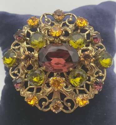#ad Brooch Czech Republic with pink and yellow rhinestones and gold tone Filigree $50.00