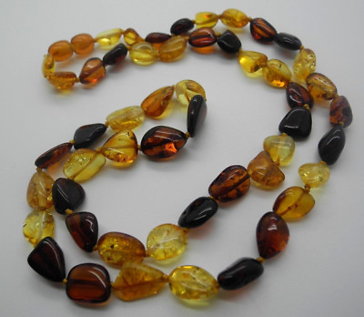 #ad Natural Baltic amber olive shape necklace on thread $67.00