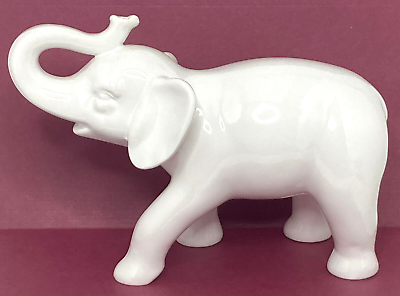 #ad Ceramic White Elephant Trunk Up Figurine 9”L x 6 3 8”H x 4” W $17.00