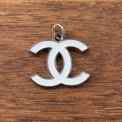 #ad Chanel Silver and White Charm ; 25mm $20.00