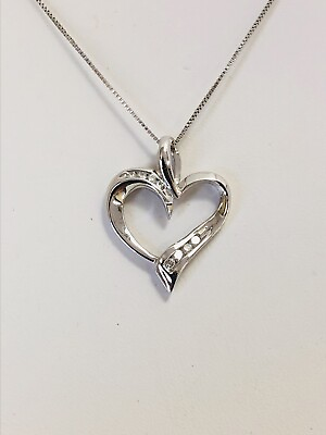 #ad 14 Karat White Gold Heart Diamond Pendant And Chain. $199.00