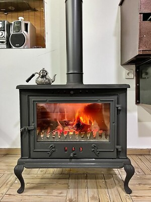 #ad Cast iron wood burning stove wood burning fireplace. $2080.00