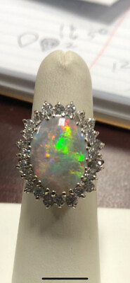 #ad Opal Dia Halo Beautiful flashes of color All natural 14k white gold 15x11.6mm $1995.00