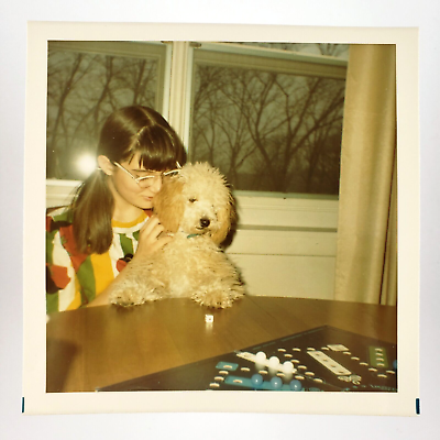 #ad Girl Smelling Her Dog Photo 1960s Board Game Pigtails Woman Color Snapshot A4265 $29.95