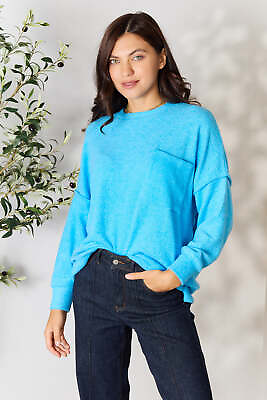 #ad Zenana Round Neck Long Sleeve Sweater with Pocket $28.49