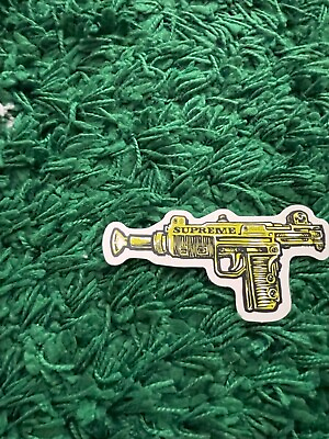 #ad Supreme Uzi Gun Yellow Sticker $15.00