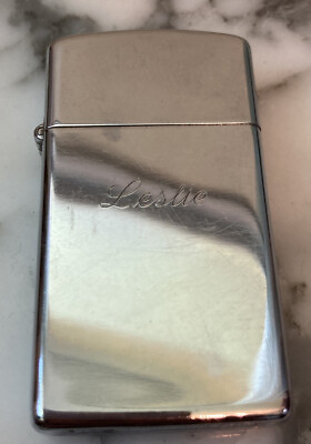 #ad Slim ZIPPO XII Chrome Engraved Leslie Some Scratches Made In Bradford PA $26.00