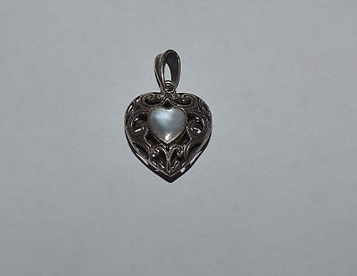 #ad VINTAGE STERLING SILVER AND MOTHER OF PEARL ORNATE HEART PENDANT $19.00