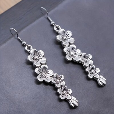 #ad Silver Flower Dangle Earrings $14.00