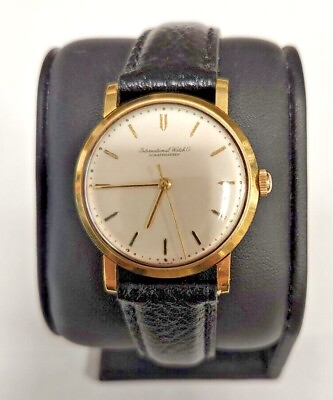 #ad IWC 18k gold wrist watch. Mechanical wind up movement with leather band. $2559.99
