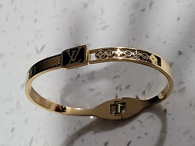 #ad LOUIS V bangle bracelet Gold And Black tone size 7 stainless steel. $59.99