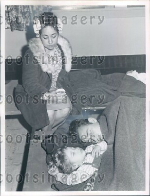 #ad 1968 Flood Refugees Woman in Curlers Watches Husband Daughter Sleep Press Photo $15.00